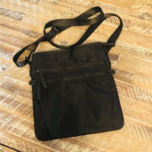 Tracker travel safe Crossbody purse with RFID protected pocket